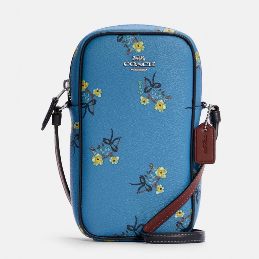 Coach Leather Crossbody bag: North/South
Zip Phone Crossbody With Floral Bow
